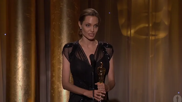 Angelina Jolie receives the Jean Hersholt Humanitarian Award at the 2013 Governors Awards