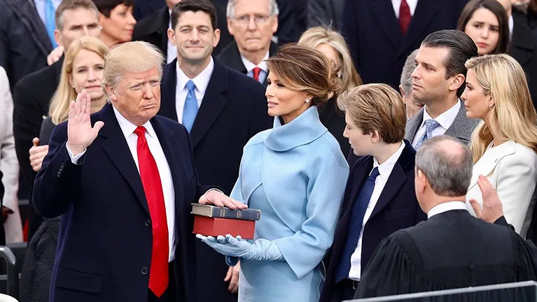 Donald Trump takes the oath of office to be sworn in as the 45th president of the US